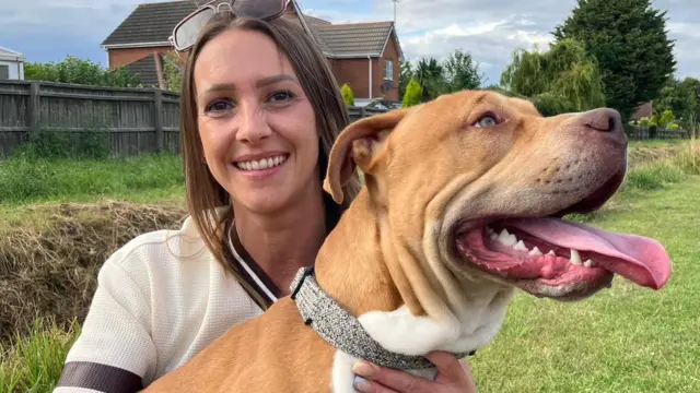 Family with American Bulldog