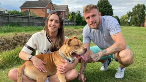 Family with American Bulldog